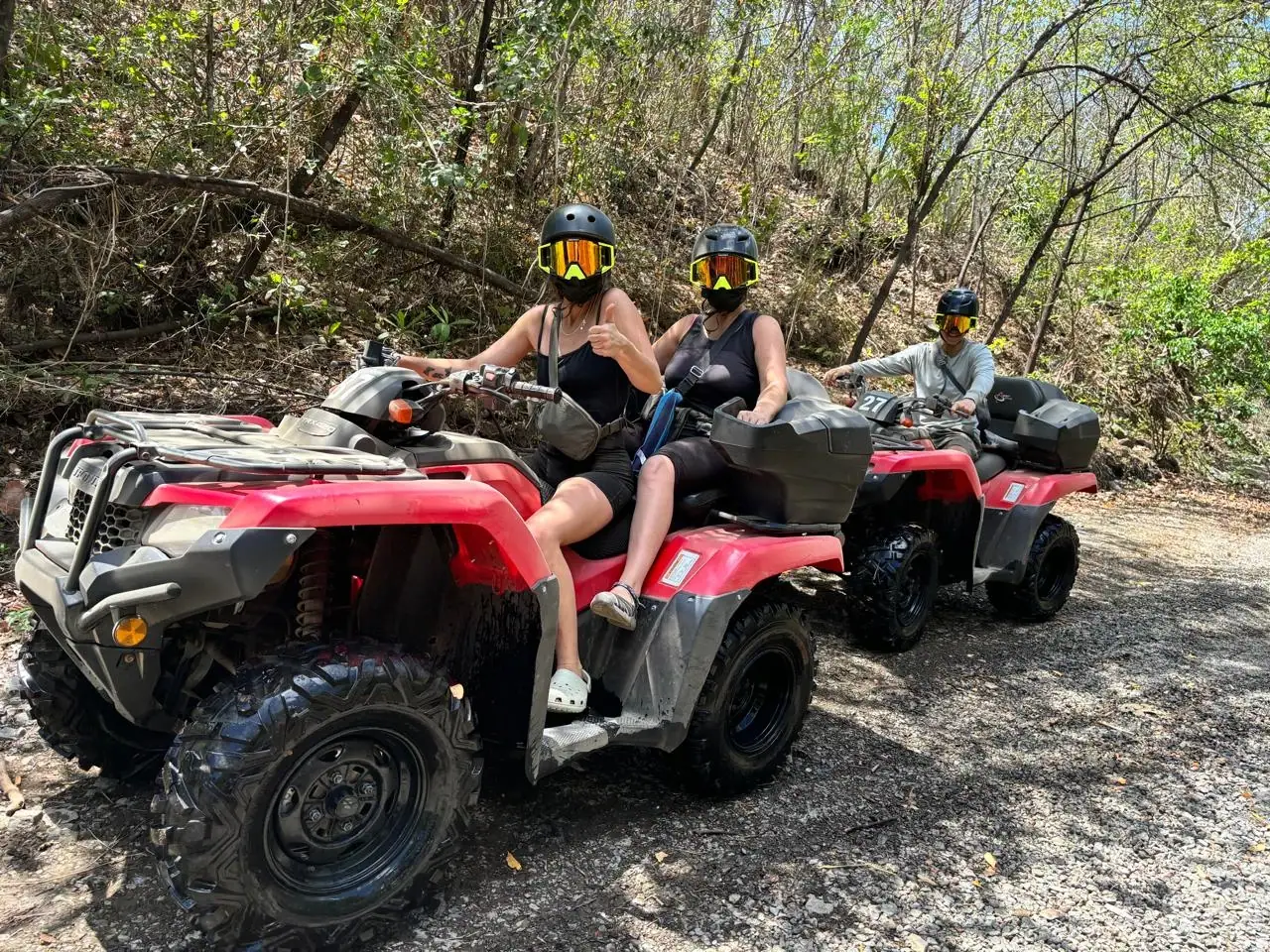 Group of riders on ATVs in the Guanacaste forest